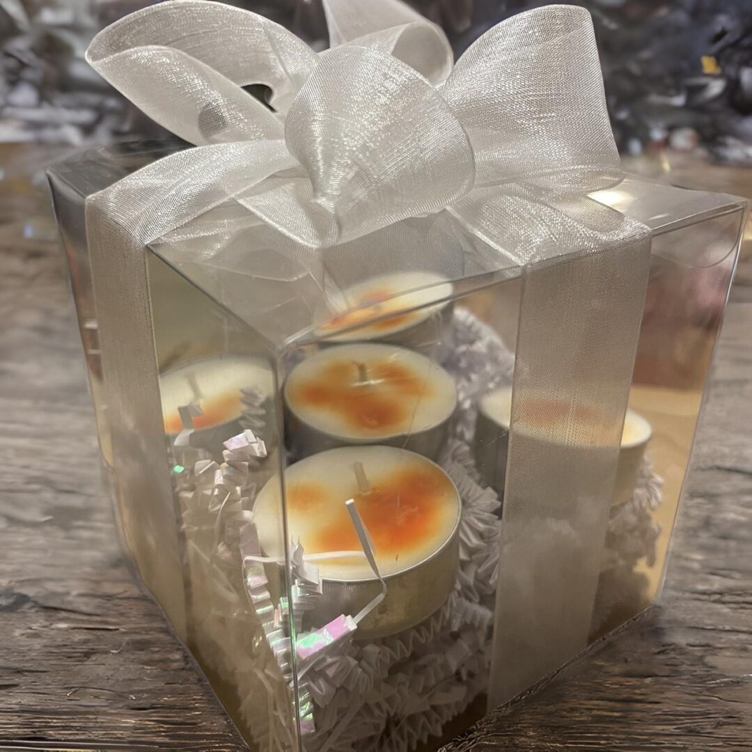 Customized candle gift packed with a ribbon